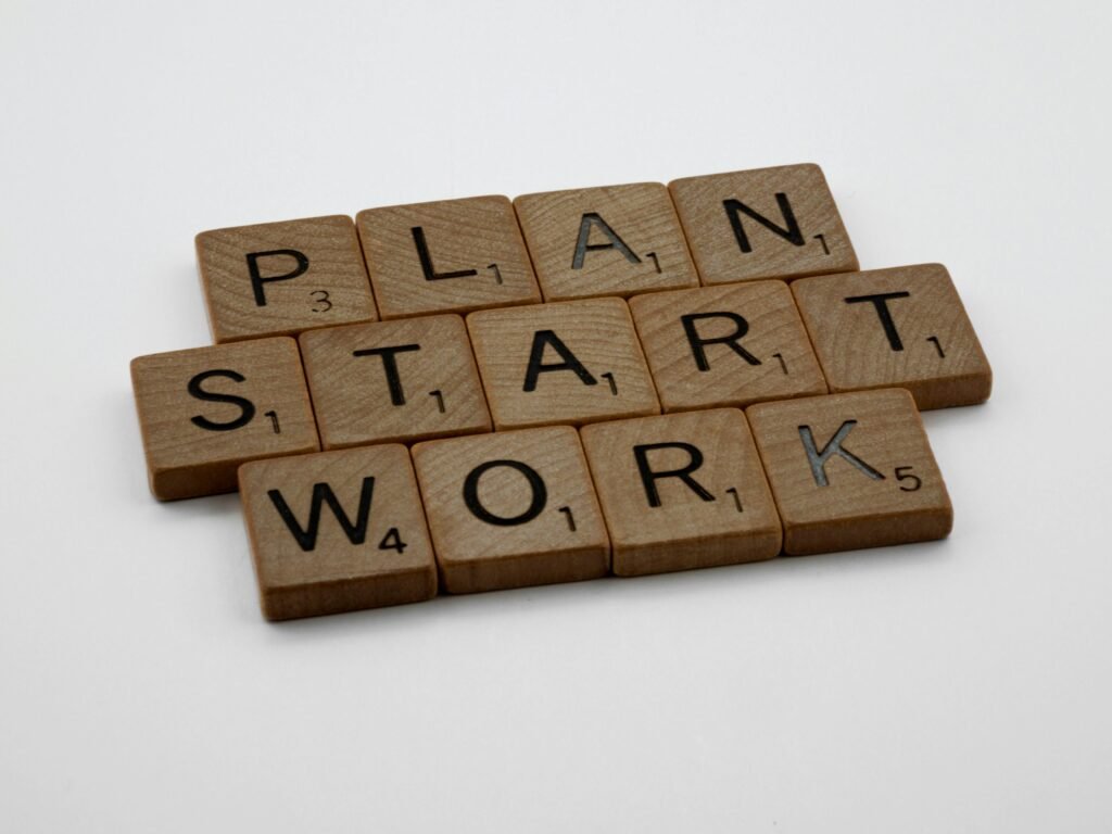 Brown Wooden Scrabble Tiles on White Surface